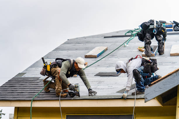 Professional Roofing technician working in North Canton, CT
